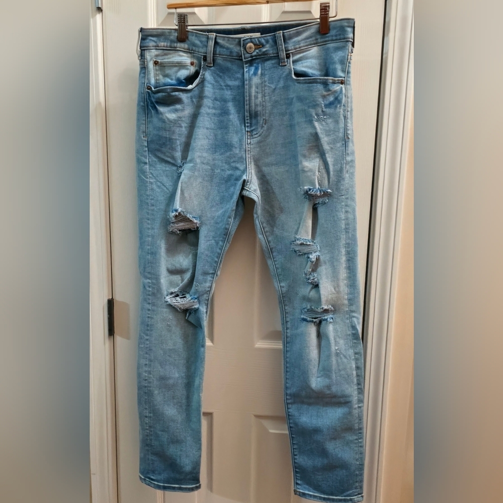 PacSun Slim Tapered Destroyed Jeans in a Light Indigo Blue.  32x32